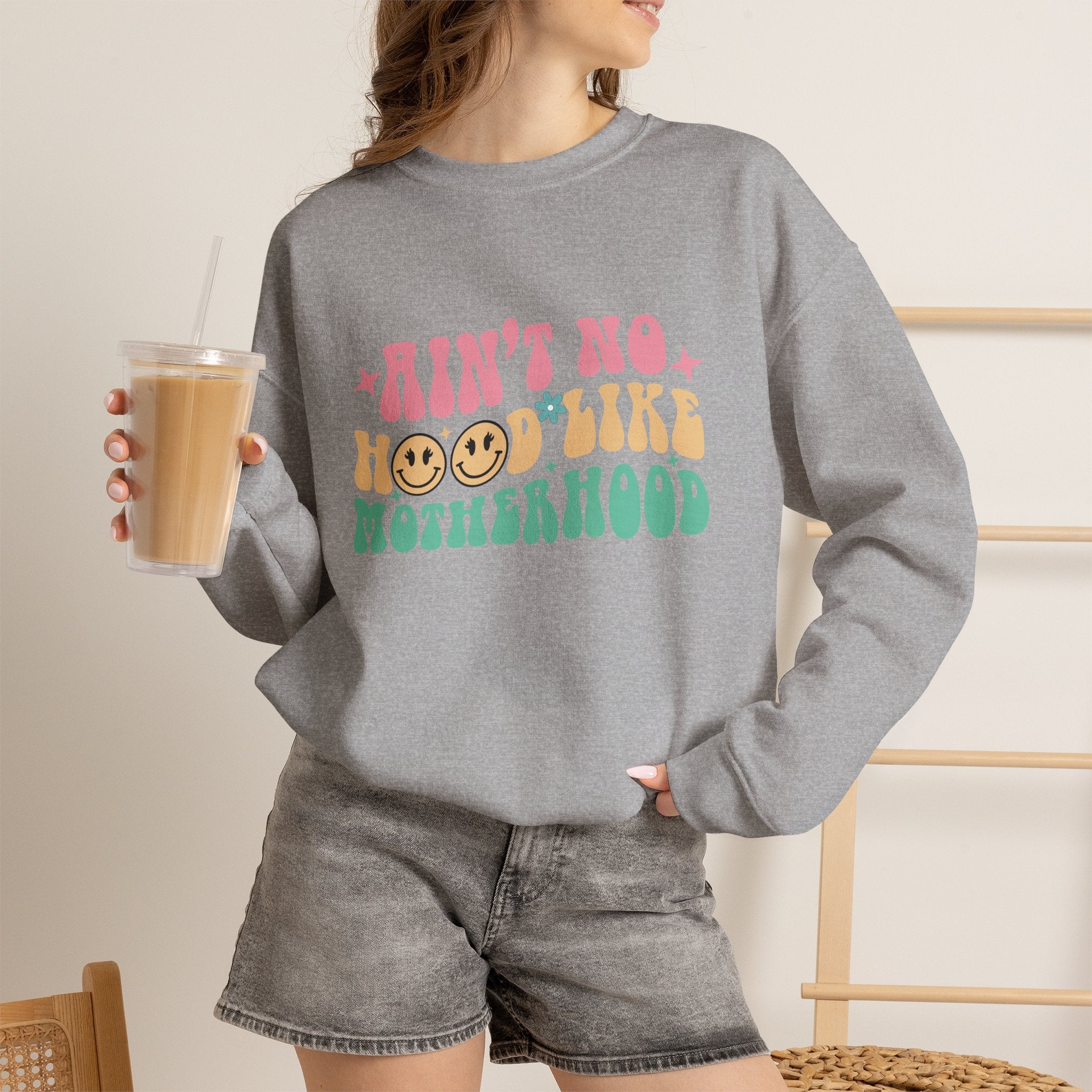 Motherhood Crewneck Sweatshirt – “Ain’t No Hood Like Motherhood” Retro Smiley Design