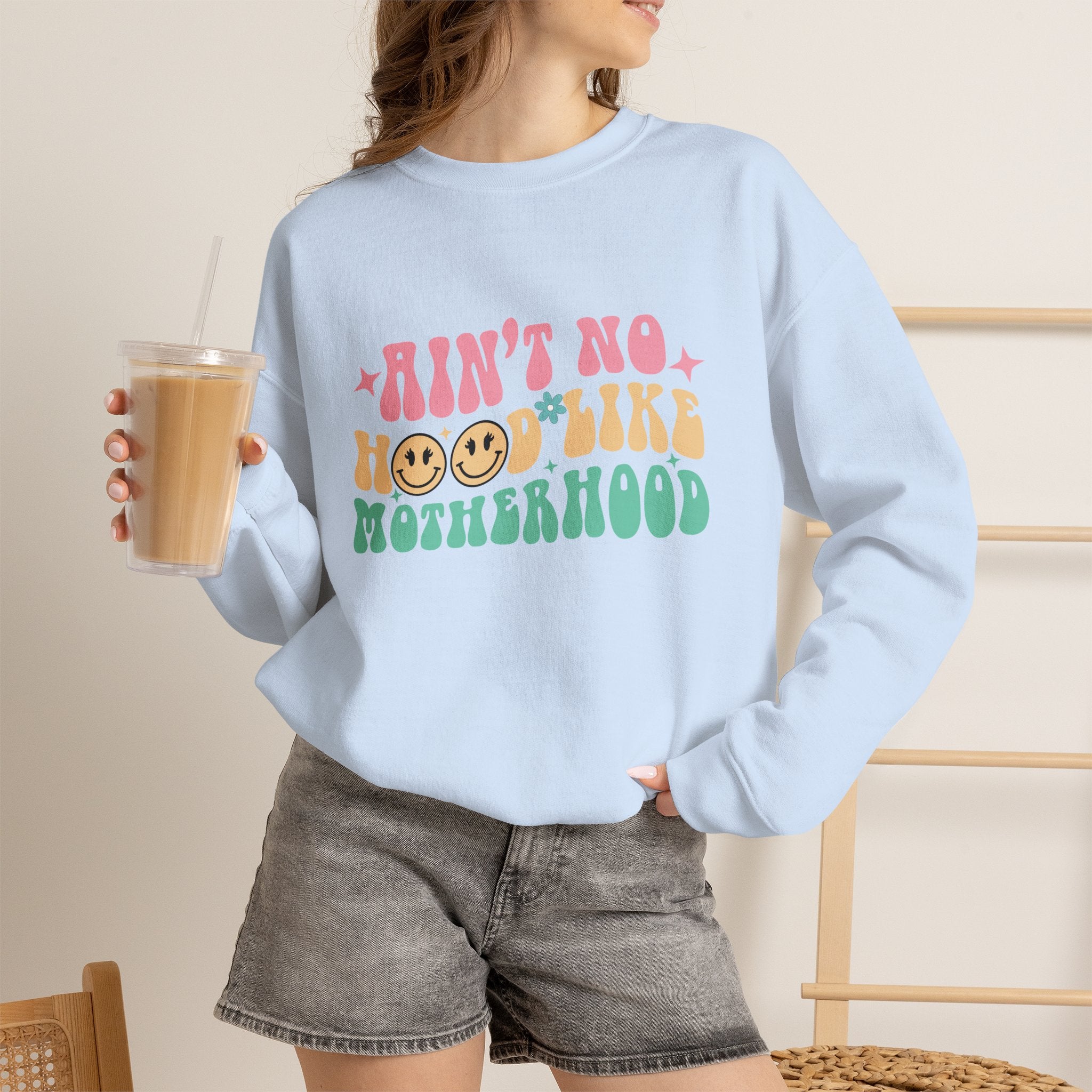 Motherhood Crewneck Sweatshirt – “Ain’t No Hood Like Motherhood” Retro Smiley Design